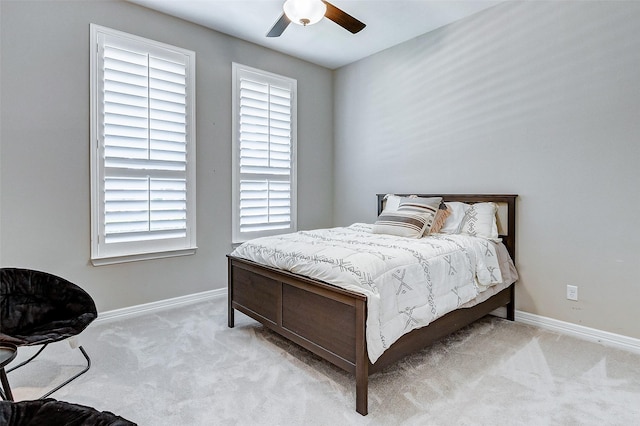 28606 Royal Pines Ct, Fulshear, TX 77441 - carpeted bedroom featuring multiple windows and ceiling fan