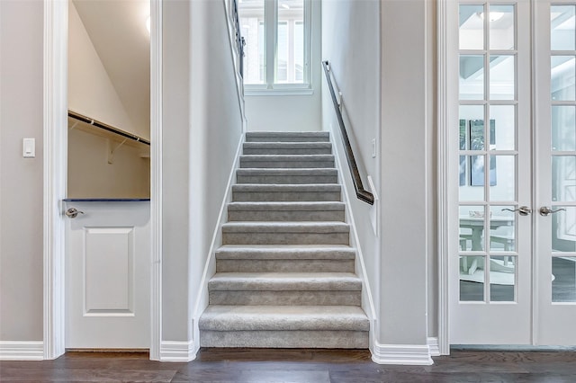 28606 Royal Pines Ct, Fulshear, TX 77441 - staircase with wood finished floors and french doors