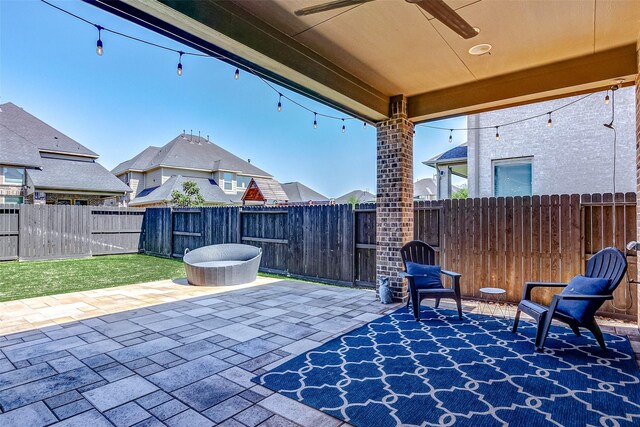 28606 Royal Pines Ct, Fulshear, TX 77441 - fenced backyard with a ceiling fan and a patio area