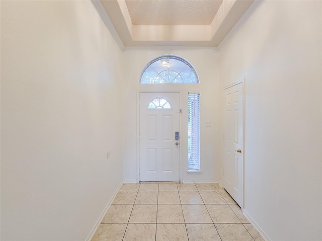 15311 Streetcar Ct, Cypress, TX 77429 - foyer with a tray ceiling and light tile patterned floors