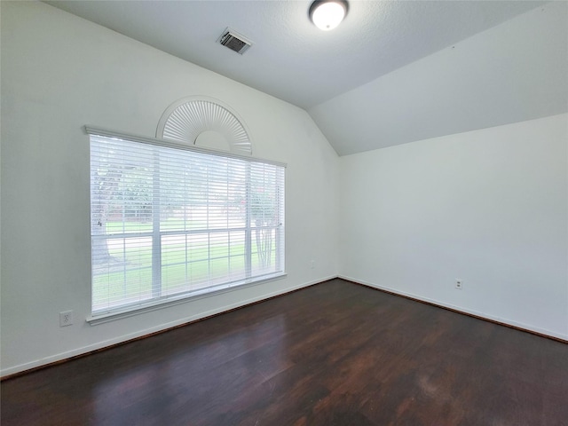 15311 Streetcar Ct, Cypress, TX 77429 - additional living space with dark wood-type flooring, lofted ceiling, and plenty of natural light