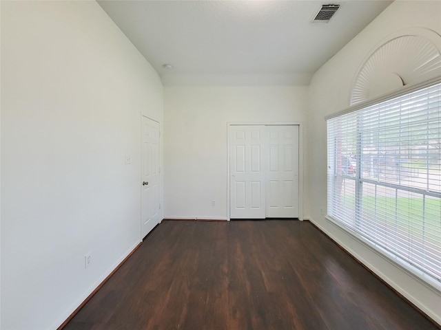 15311 Streetcar Ct, Cypress, TX 77429 - unfurnished bedroom featuring dark wood finished floors and a closet