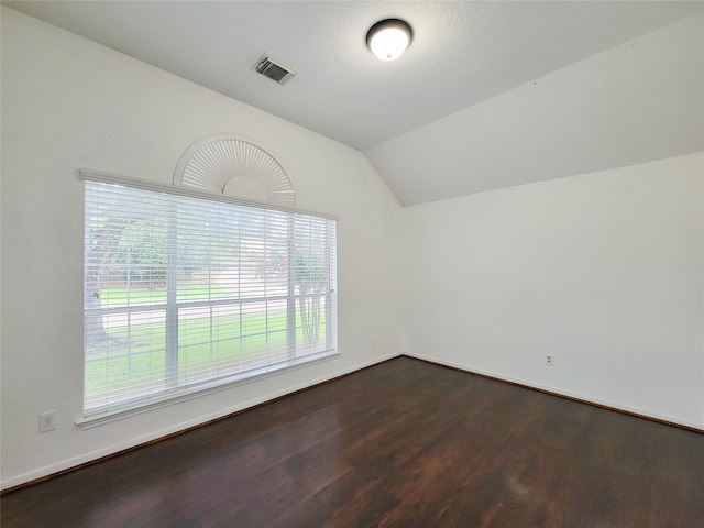15311 Streetcar Ct, Cypress, TX 77429 - additional living space with dark wood-style flooring, plenty of natural light, and lofted ceiling