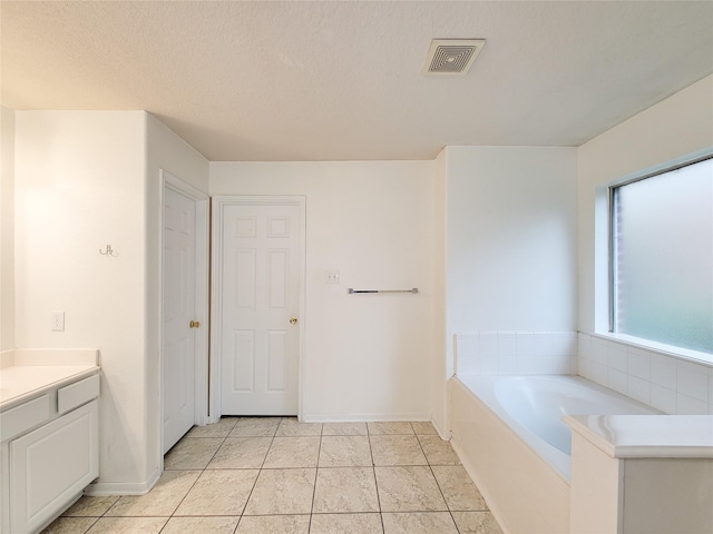 15311 Streetcar Ct, Cypress, TX 77429 - full bath with a bath, vanity, and tile patterned flooring