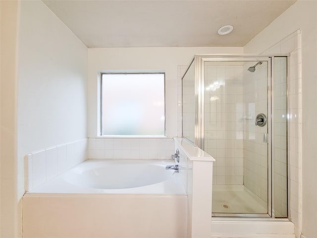 15311 Streetcar Ct, Cypress, TX 77429 - bathroom featuring a stall shower and a garden tub