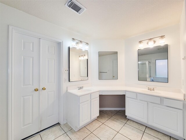 15311 Streetcar Ct, Cypress, TX 77429 - bathroom featuring tile patterned flooring and double vanity