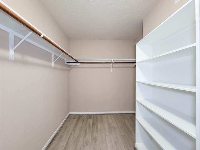 15311 Streetcar Ct, Cypress, TX 77429 - spacious closet featuring wood finished floors