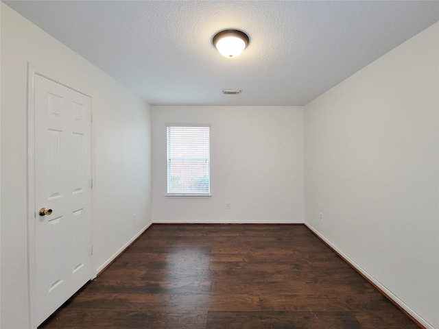 15311 Streetcar Ct, Cypress, TX 77429 - unfurnished room featuring wood finished floors and a textured ceiling