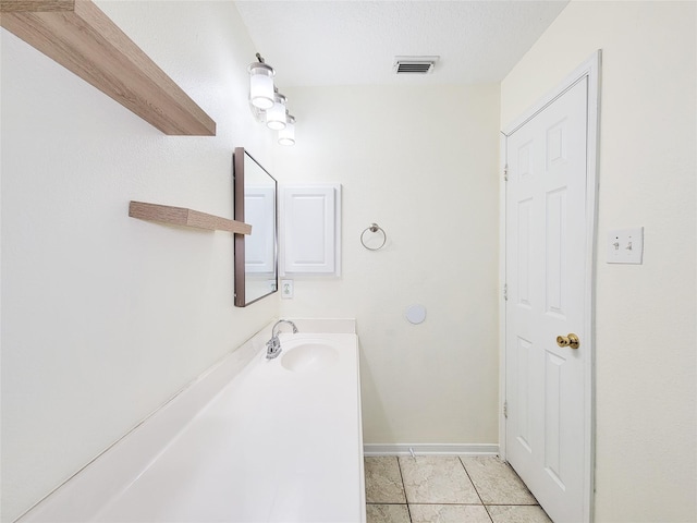15311 Streetcar Ct, Cypress, TX 77429 - bathroom featuring tile patterned floors and vanity
