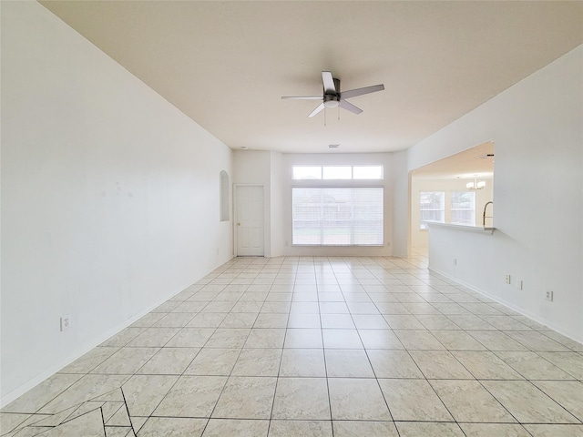 15311 Streetcar Ct, Cypress, TX 77429 - empty room with ceiling fan and light tile patterned floors