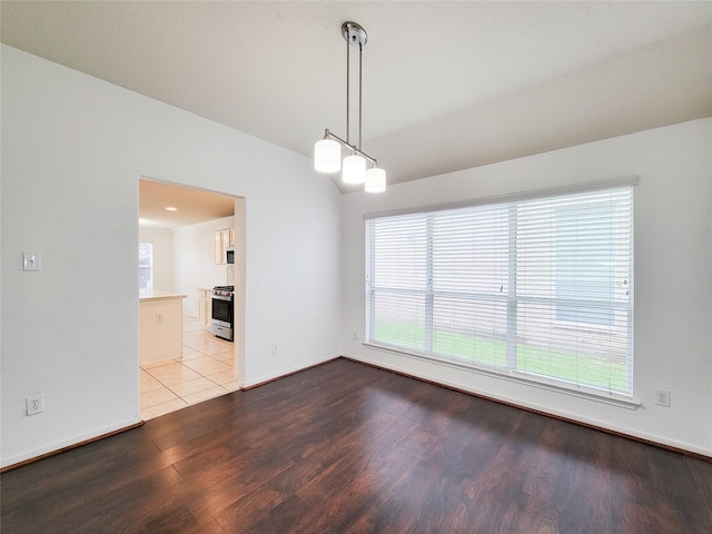 15311 Streetcar Ct, Cypress, TX 77429 - unfurnished room featuring wood finished floors and lofted ceiling