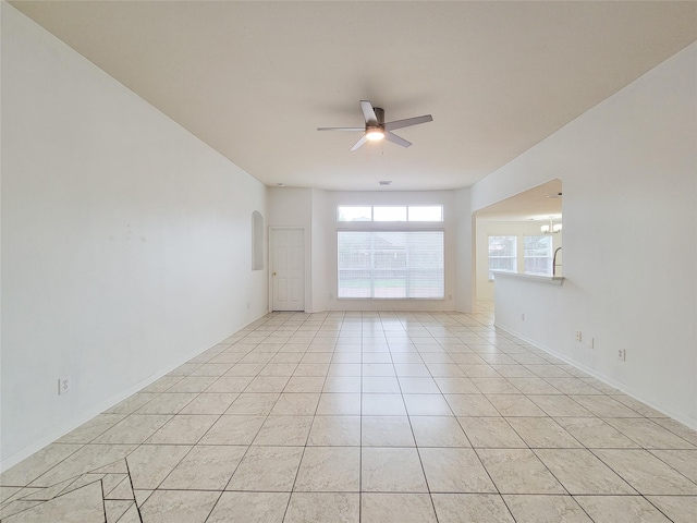15311 Streetcar Ct, Cypress, TX 77429 - spare room with a ceiling fan and light tile patterned floors