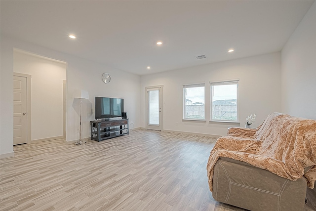 1815 Sandy Trail Ln, Rosenberg, TX 77469 - living area featuring light wood finished floors and recessed lighting