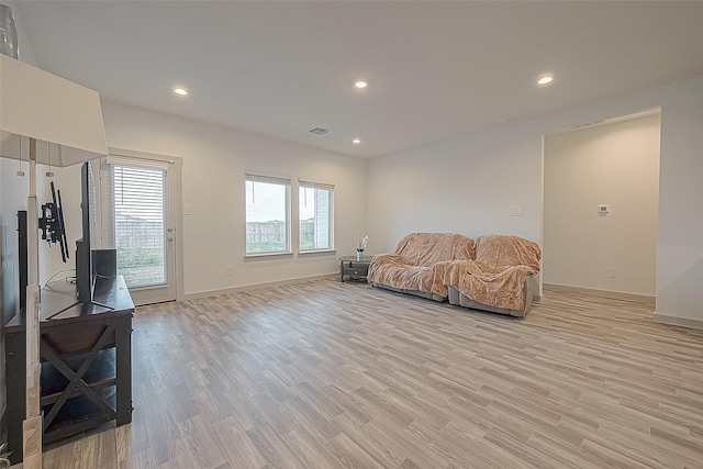 1815 Sandy Trail Ln, Rosenberg, TX 77469 - living area featuring light wood finished floors and recessed lighting
