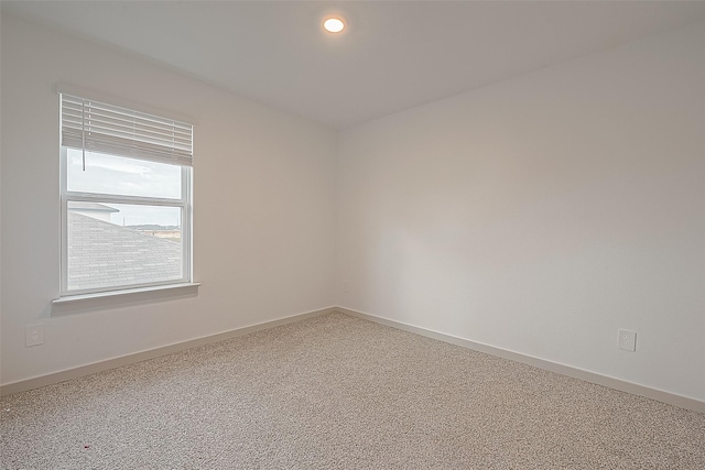 1815 Sandy Trail Ln, Rosenberg, TX 77469 - carpeted empty room with baseboards and recessed lighting