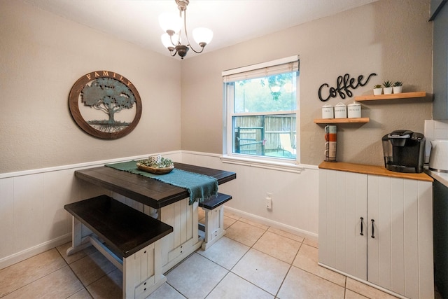 15638 Charolais Dr, Cypress, TX 77429 - dining area with light tile patterned floors and wainscoting