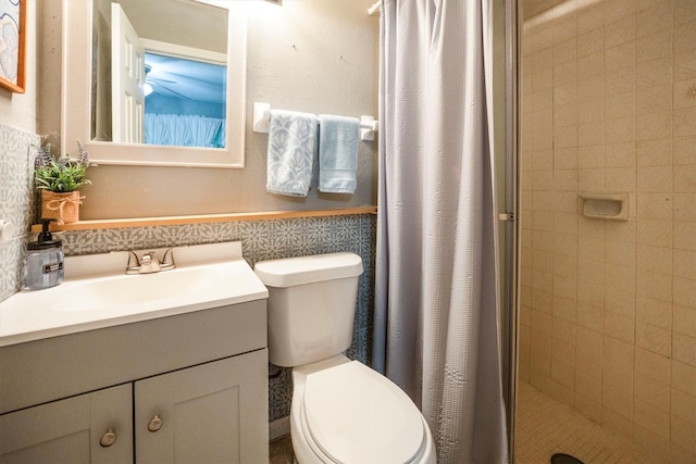 15638 Charolais Dr, Cypress, TX 77429 - bathroom featuring a stall shower, vanity, and a wainscoted wall