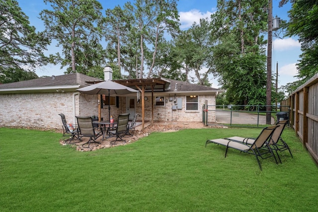 15638 Charolais Dr, Cypress, TX 77429 - back of property with brick siding, a fenced backyard, a patio area, and roof with shingles