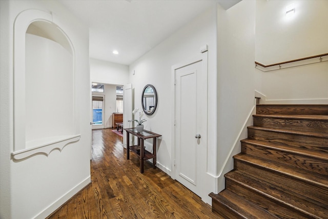 6410 Rodrigo St Unit B, Houston, TX 77007 - hallway featuring dark wood finished floors, stairway, and recessed lighting