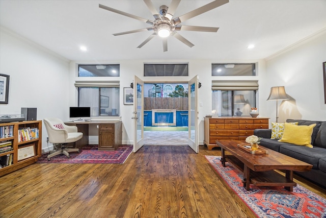 6410 Rodrigo St Unit B, Houston, TX 77007 - living area featuring dark wood-style flooring, ornamental molding, a ceiling fan, and recessed lighting