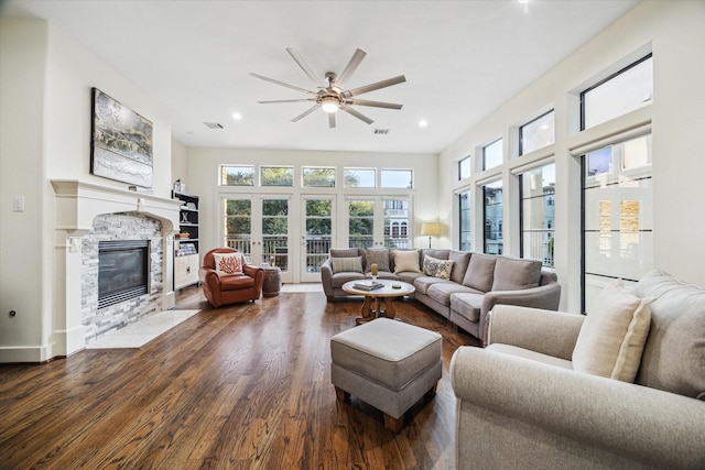 6410 Rodrigo St Unit B, Houston, TX 77007 - living room with ceiling fan, a stone fireplace, dark wood finished floors, and recessed lighting