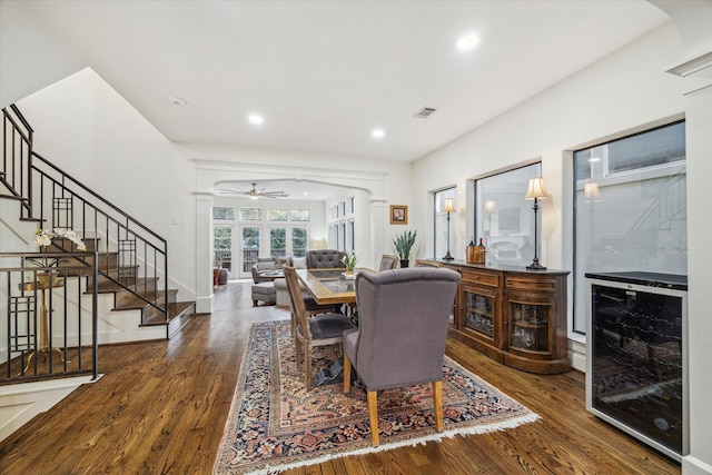 6410 Rodrigo St Unit B, Houston, TX 77007 - dining area featuring stairway, wood finished floors, ceiling fan, wine cooler, and recessed lighting
