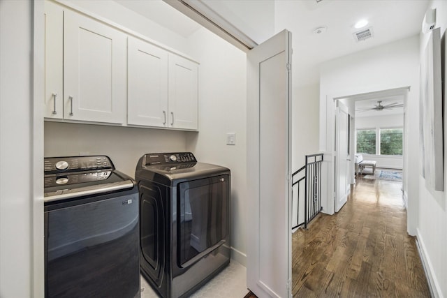 6410 Rodrigo St Unit B, Houston, TX 77007 - laundry area featuring cabinet space, washer and clothes dryer, wood finished floors, and a ceiling fan