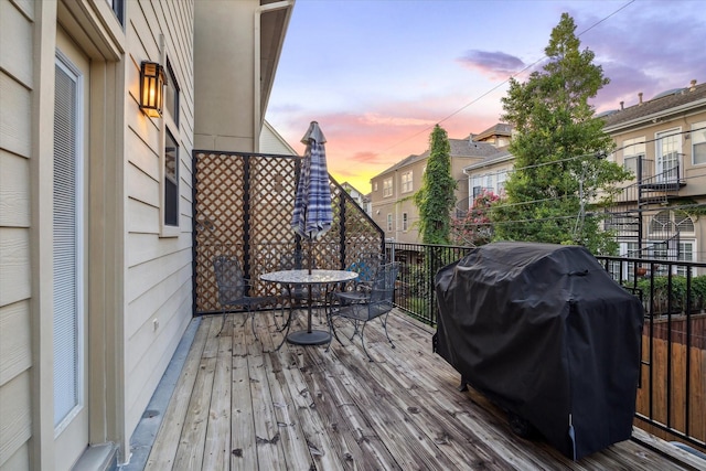 6410 Rodrigo St Unit B, Houston, TX 77007 - wooden deck featuring grilling area and outdoor dining area