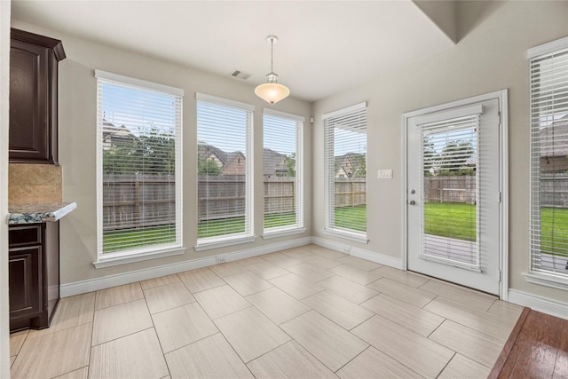 3834 Trophy Ridge Dr, Spring, TX 77386 - unfurnished dining area with baseboards