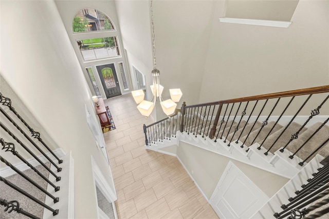 3834 Trophy Ridge Dr, Spring, TX 77386 - entryway featuring a high ceiling and stairs