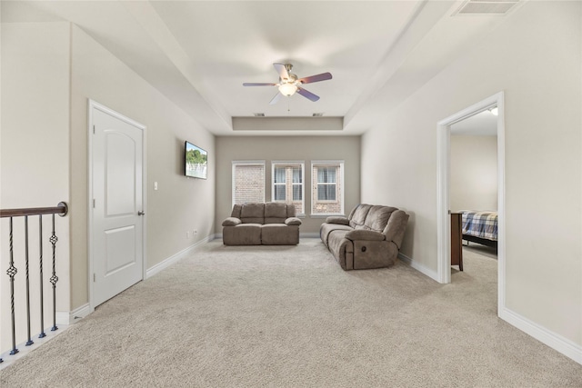 3834 Trophy Ridge Dr, Spring, TX 77386 - carpeted living room with a raised ceiling and ceiling fan