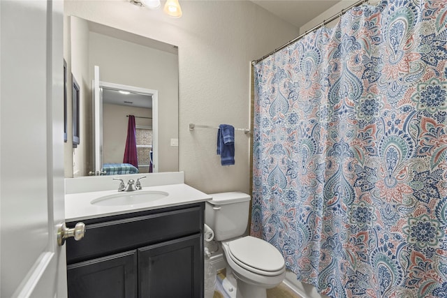 3834 Trophy Ridge Dr, Spring, TX 77386 - full bath with vanity, a textured wall, and a shower with shower curtain