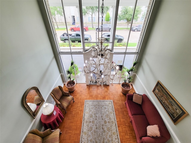 2600 Bellefontaine St Unit A21, Houston, TX 77025 - living room featuring healthy amount of natural light and a chandelier