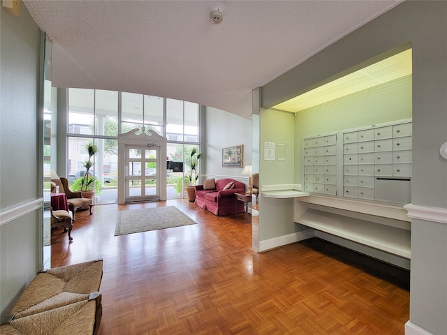 2600 Bellefontaine St Unit A21, Houston, TX 77025 - common area with floor to ceiling windows and a textured ceiling