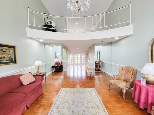 2600 Bellefontaine St Unit A21, Houston, TX 77025 - living room featuring a high ceiling and a chandelier