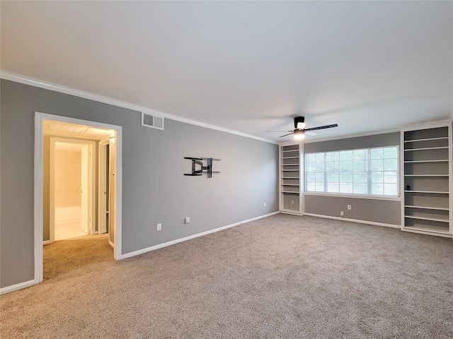 2600 Bellefontaine St Unit A21, Houston, TX 77025 - spare room featuring crown molding, carpet, and a ceiling fan