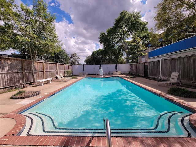 2600 Bellefontaine St Unit A21, Houston, TX 77025 - view of pool featuring a fenced backyard and a patio
