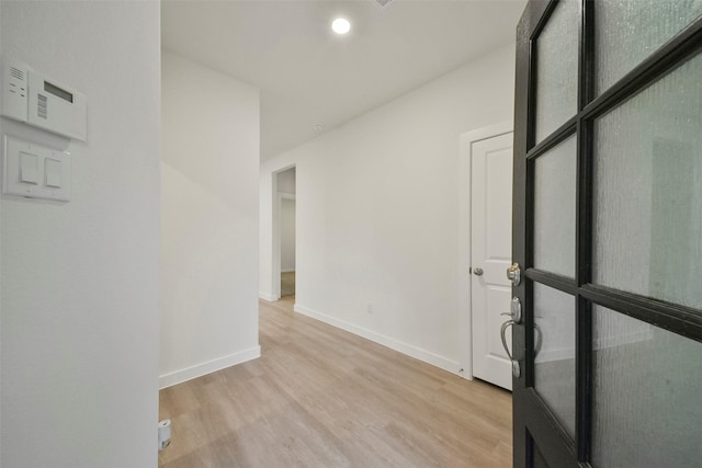 19358 Poppy Village Cir, Magnolia, TX 77355 - hallway with light wood-style flooring and recessed lighting