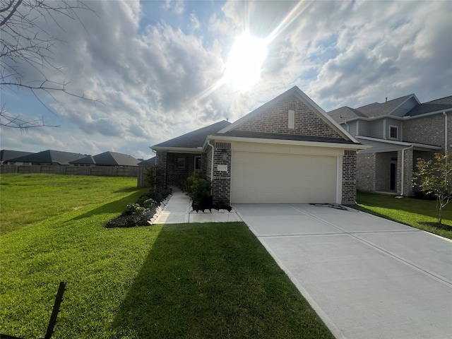 19358 Poppy Village Cir, Magnolia, TX 77355 - view of front of home with brick siding, a garage, and driveway