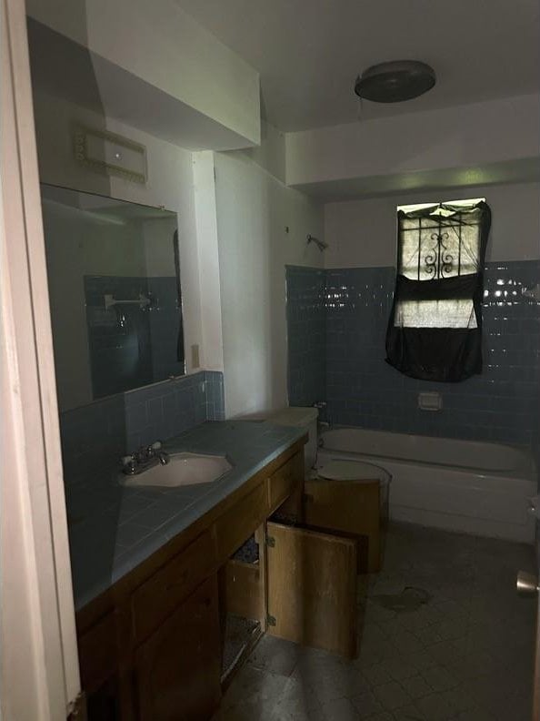 4625 Los Angeles St, Houston, TX 77026 - bathroom featuring shower / bath combination and vanity