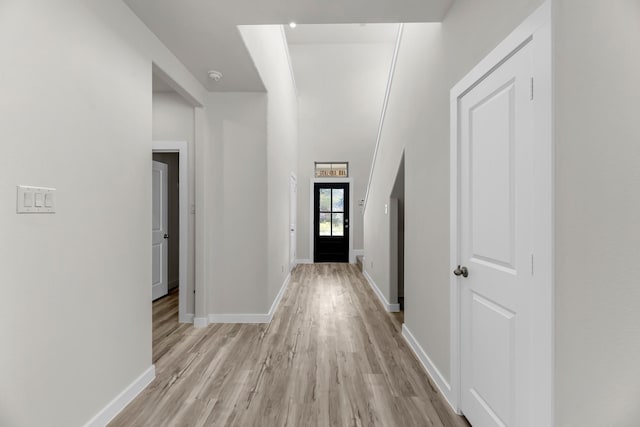 21521 Witham Promenade Ln, Magnolia, TX 77355 - foyer with light wood finished floors and baseboards