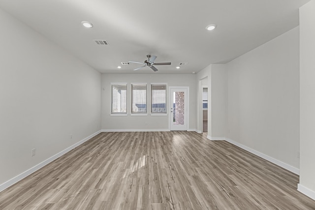 21521 Witham Promenade Ln, Magnolia, TX 77355 - unfurnished living room featuring ceiling fan, light wood-style floors, and recessed lighting