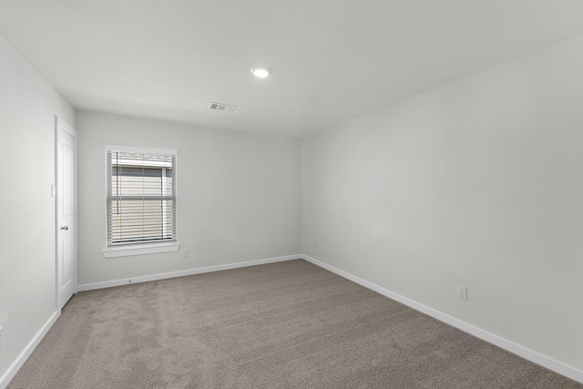 21521 Witham Promenade Ln, Magnolia, TX 77355 - empty room featuring carpet floors and recessed lighting