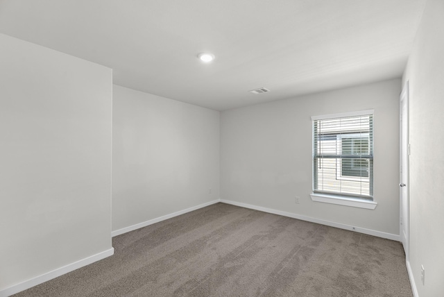 21521 Witham Promenade Ln, Magnolia, TX 77355 - carpeted spare room with baseboards and recessed lighting