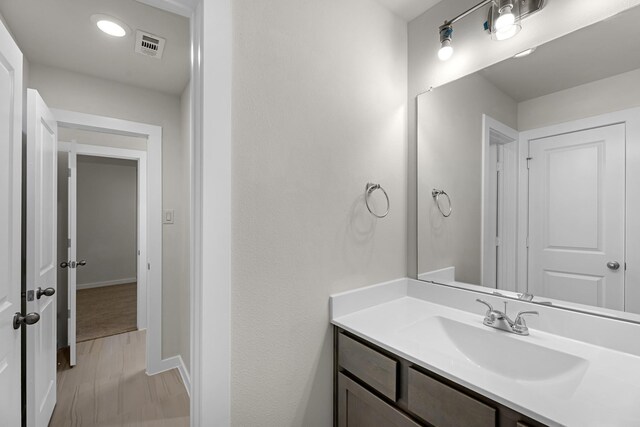 21521 Witham Promenade Ln, Magnolia, TX 77355 - bathroom featuring vanity and recessed lighting