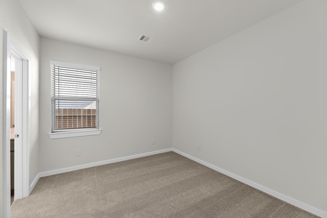 21521 Witham Promenade Ln, Magnolia, TX 77355 - spare room featuring baseboards and carpet