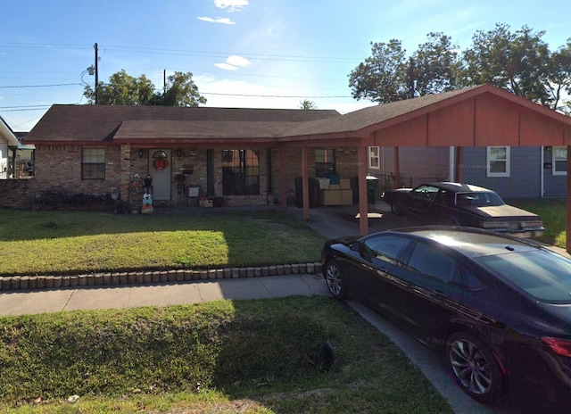 3201 Stallings Dr, Houston, TX 77088 - single story home with a front lawn, brick siding, and covered porch