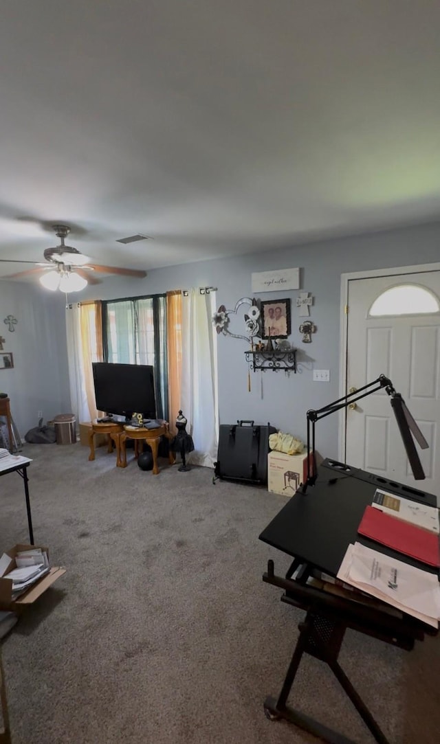 3201 Stallings Dr, Houston, TX 77088 - carpeted living area featuring a ceiling fan
