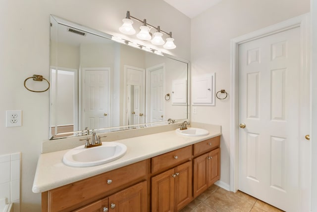 31 N Winterport Cir, The Woodlands, TX 77382 - full bathroom with double vanity and tile patterned floors