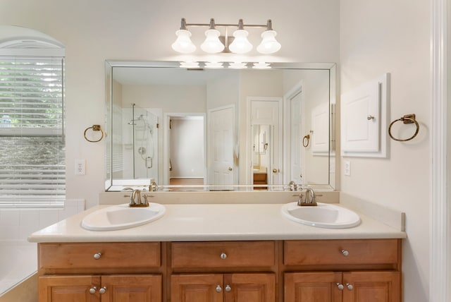 31 N Winterport Cir, The Woodlands, TX 77382 - full bathroom featuring double vanity, a shower stall, and a garden tub